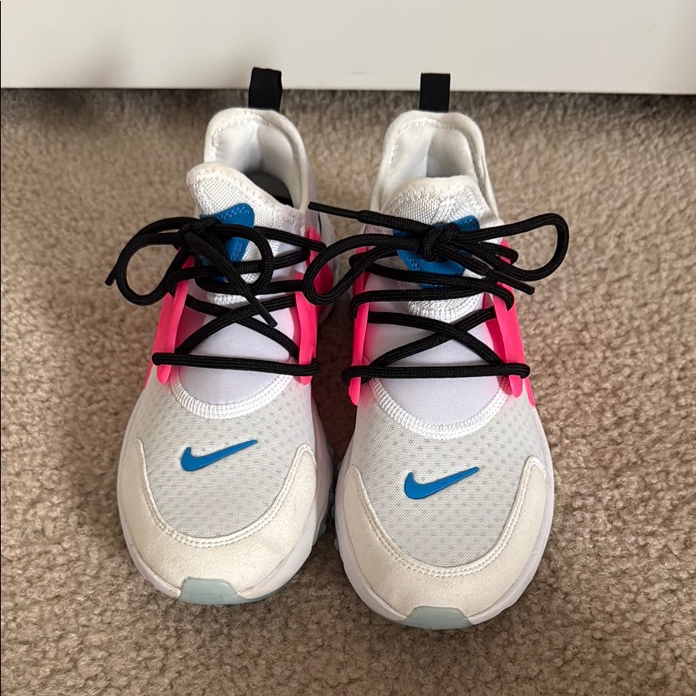Nike White and Pink Sneakers Modern Sporty Design